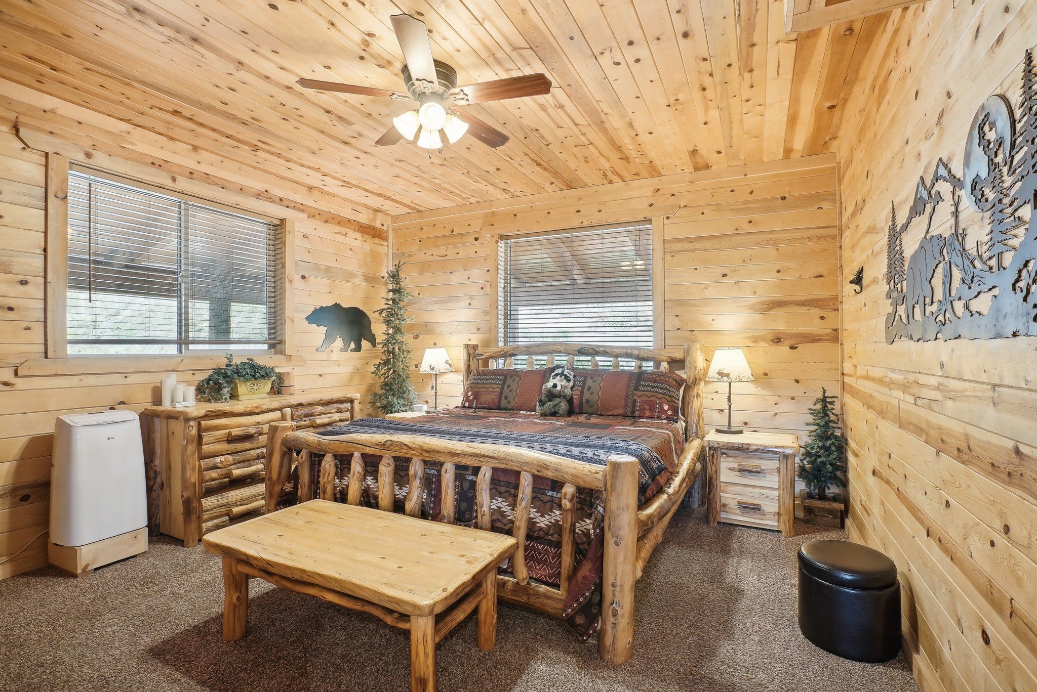 Bear Room with a king log bed on the Main Lodge main floor