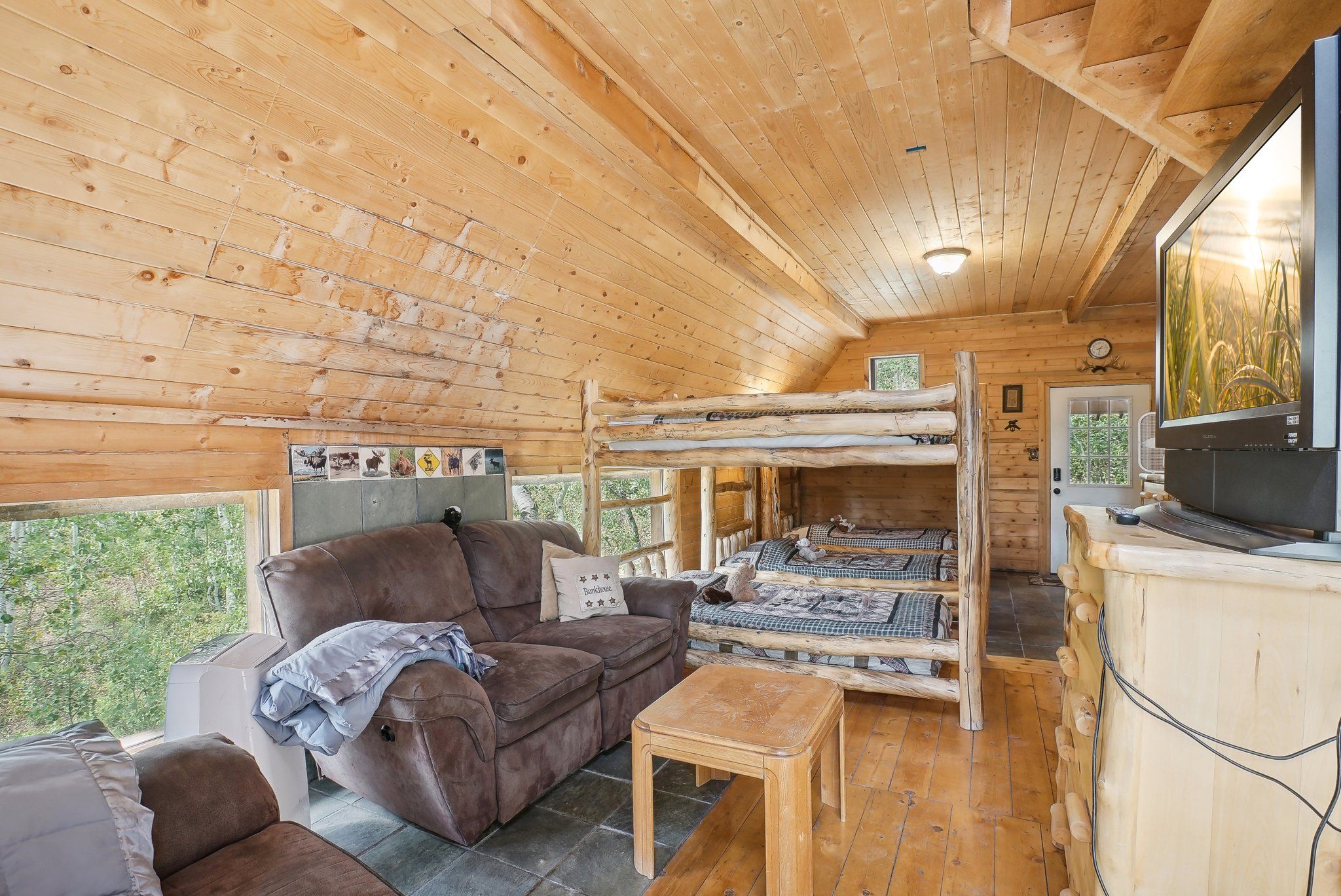 Bunkhouse TV and Xbox lounge beside the bunk room