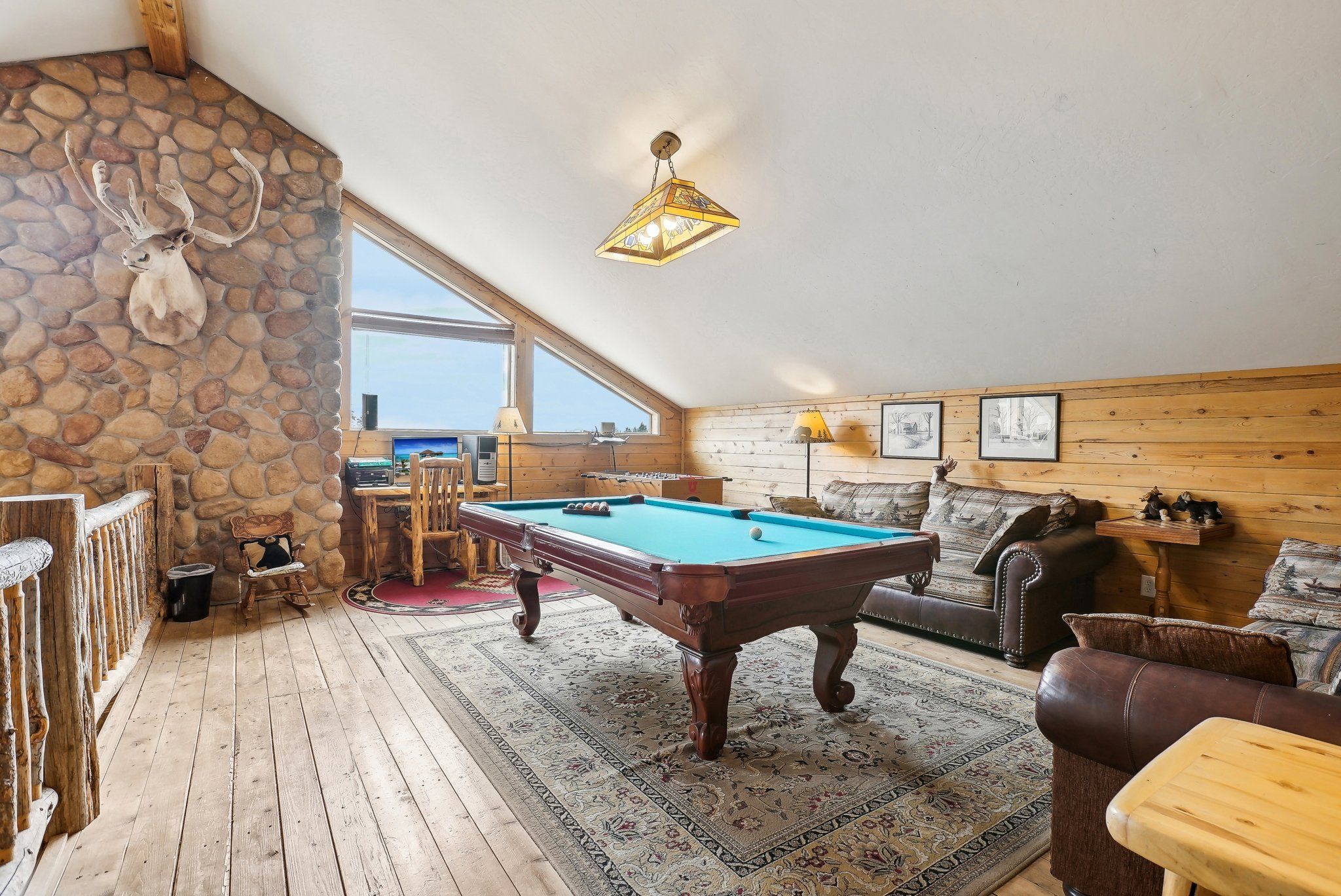 Pool table in the open game loft above the great room