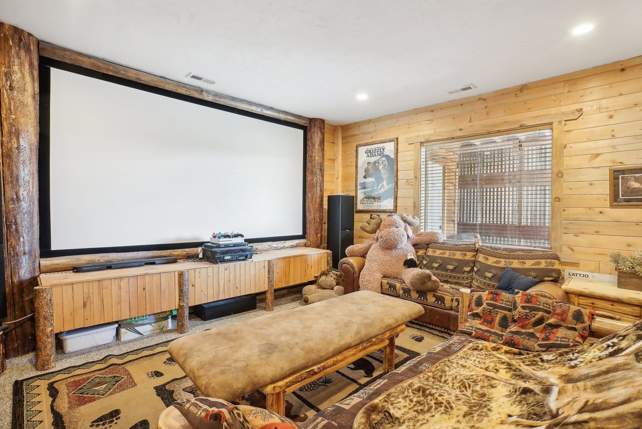 Theater seating beside the snack bar with fridge and microwave